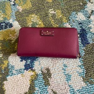 kate spade Plum Zip-Around Leather Wallet with Gold Logo Plaque